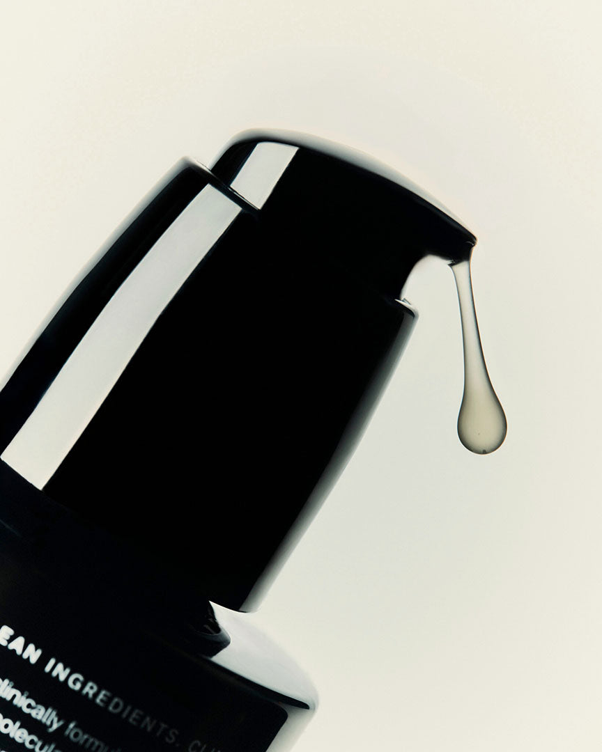 A silky drop of Collagen Jelly serum suspended from the pump